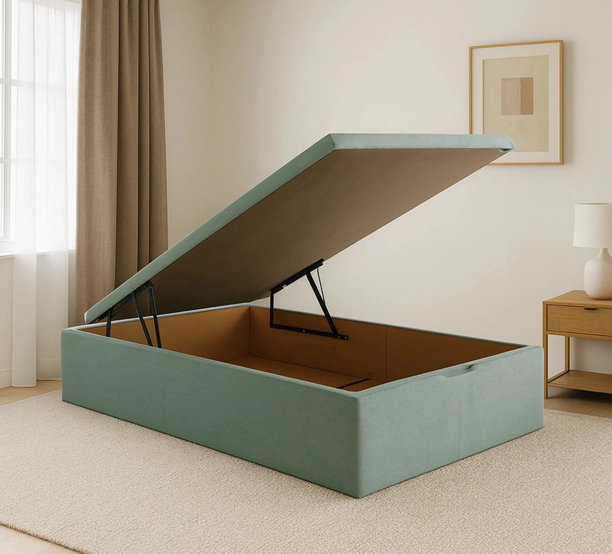 Canapé Jade Vissuto abierto tapizado verde salvia con mecanismo elevación y amplio almacenamiento interior
